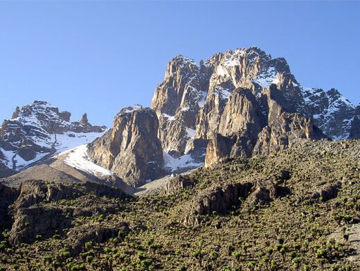 Golden sunrise over Mount Kenya’s summit peaks during the 4 Days Sirimon to Chogoria Route trek