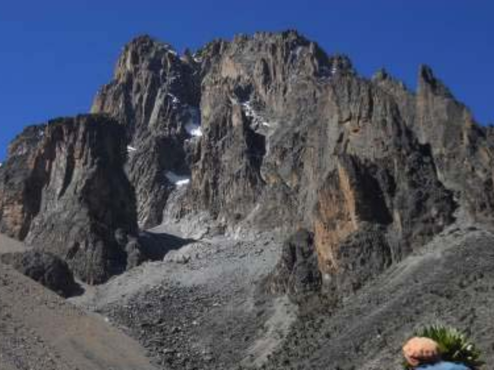 Jagged peaks of Mount Kenya including Batian, Nelion, and Point Lenana under clear skies during the 5-day Chogoria to Sirimon trek