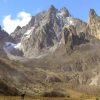 Jagged snow-capped peaks of Mount Kenya under clear skies during the 4 Days Naro Moru to Sirimon Route trek