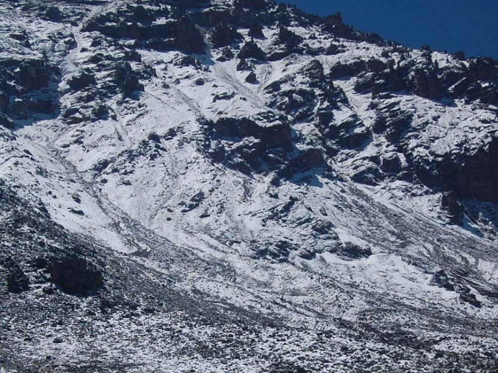 Section of the Umbwe Route on Mount Kilimanjaro showing steep rocky trail and stunning mountain scenery